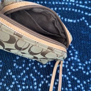 COACH tan cosmetic pouch wristlet